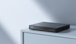 Reolink RLN16-410 black 24-Channel PoE NVR for 24/7 Continuous Recording on grey cabinet,