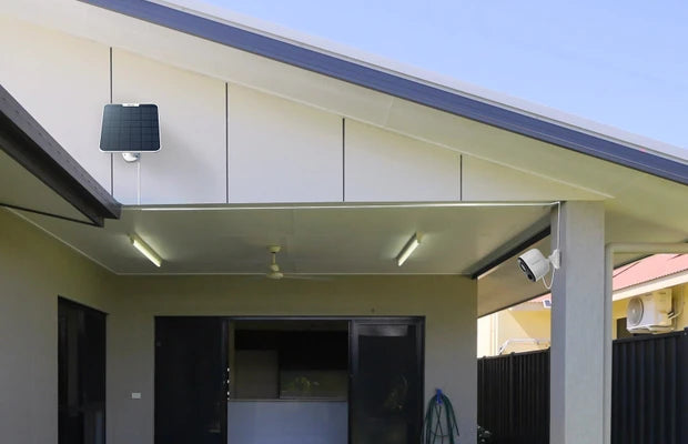 Reolink Argus 3 Ultra 4K Battery/Solar-Powered Standalone WiFi Camera with Color Night Vision on front porch with solar panel on external wall