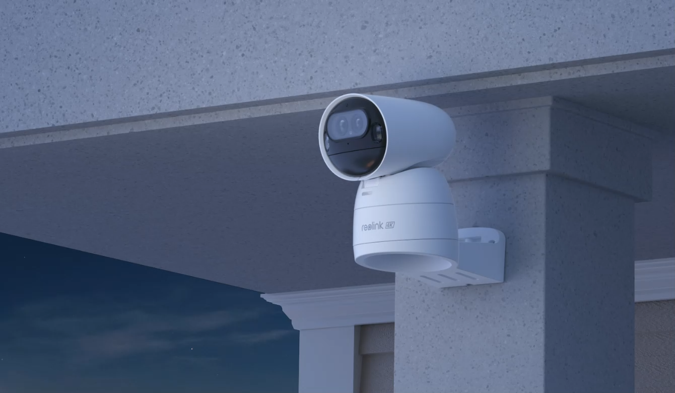 Reolink Argus Track 4K Dual-Lens Wi-Fi Solar/Battery Camera with Auto-Zoom Tracking on front porch at night