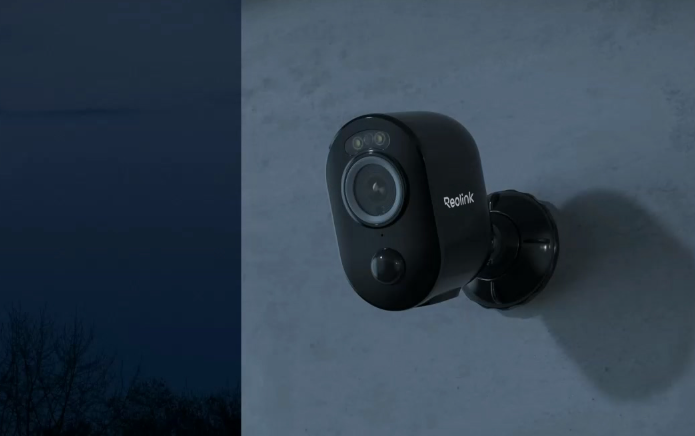 Reolink Argus 3 Pro Smart 2K 4MP Wire-Free Camera with Motion Spotlight   at night mounted on external wall
