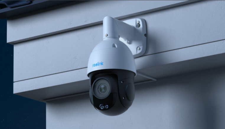 Reolink RLC-823S1 4K 360° Auto-Tracking PoE Camera with 5X Optical Zoom PTZ on wall at night