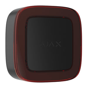 thre quarters front view of a A square AJAX fire detection indicator with rounded corners, featuring a dark gray textured center and a glossy dark red outer frame accented by a thin red line, set against a plain white background.