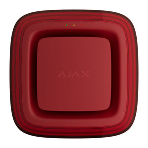 A square AJAX VAD sounder front view on a solid white background. The device features a glossy deep red front face with the AJAX logo in the center, a series of three small LED indicator lights near the top edge, and a thick, rounded outer frame with subtle dark red concentric stripes.