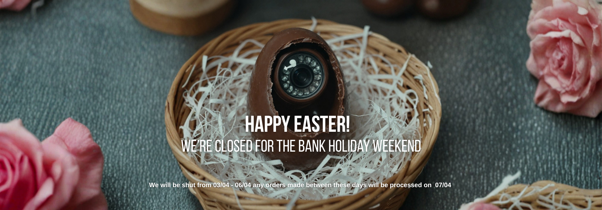 Easter closure message with chocolate egg around a cctv camera lens and flowers on a textured surface