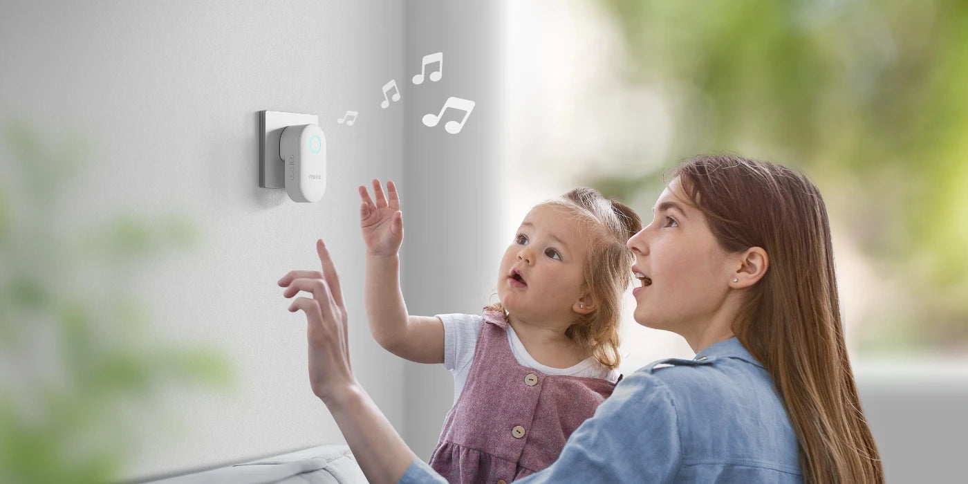 Reolink Chime, Best Companion for Reolink Video Doorbell playing noise in front of woman and young girl.