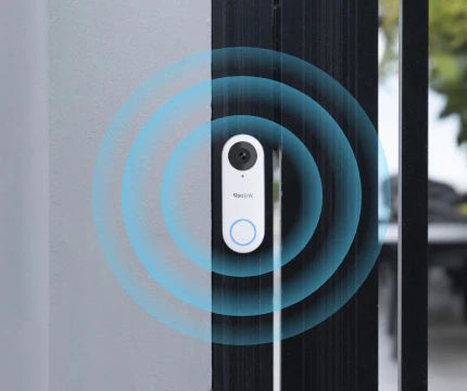 reolink wired wifi video doorbell camera fixed to door, emitting wifi signal 