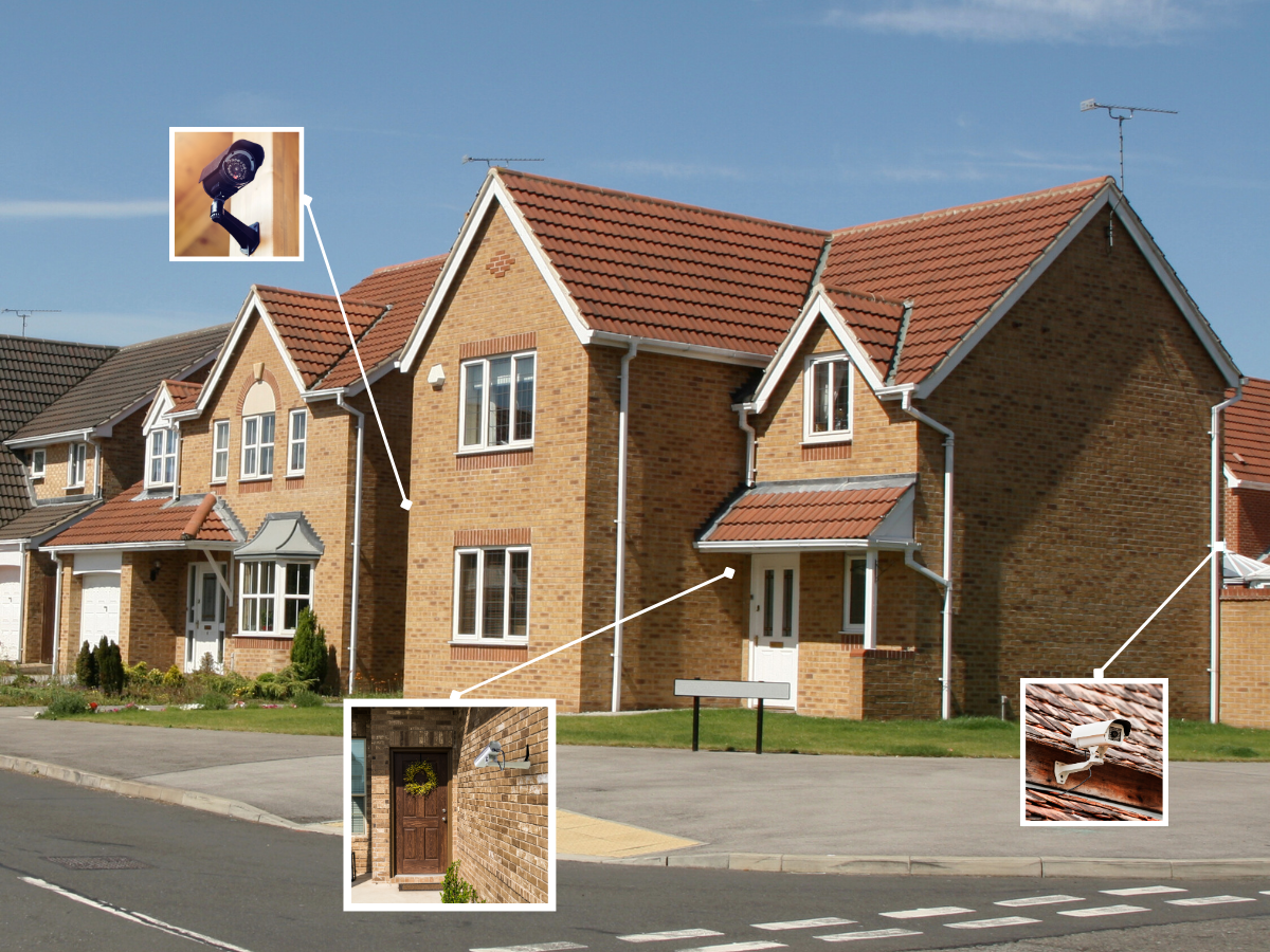 Brick house with a blue sky background with best places for cctv cameras positions highlighted