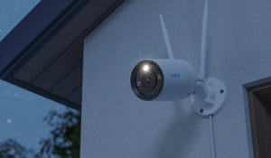 RLC-810WA 4K Wi-Fi 6 Surveillance Camera, Faster Speed & Higher Stability on outside wall at night with white ligfht activated