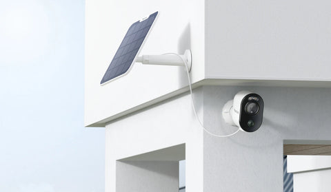 Reolink Argus 3E 3MP Wireless Solar & Battery Powered Security Camera with Smart Detection on building plugged into reloink 6W solar panel