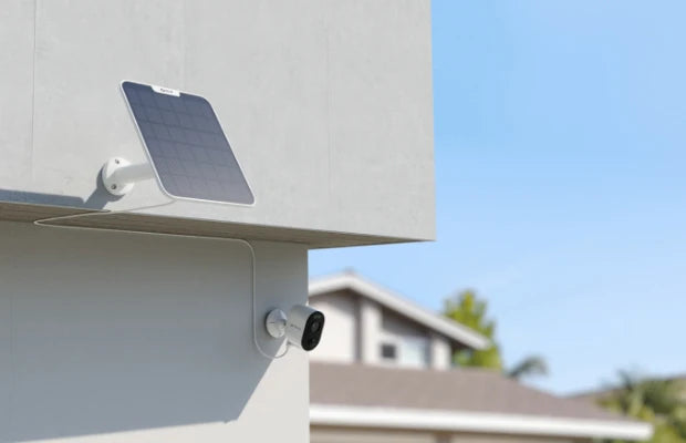 Reolink Argus 3 Ultra 4K Battery/Solar-Powered Standalone WiFi Camera with Color Night Vision on external wall plugged into 6W solar panel