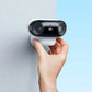 Reolink Argus 4 Pro Smart 4K ColorX Dual-Lens Solar/Battery Camera with 180° Panorama hand placing camera on wall
