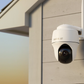 Reolink Argus PT Ultra 4K 8MP Wireless Pan & Tilt Standalone Solar/Battery Camera with Spotlights mounted on external wall and sunset 