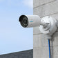 Reolink B10 Junction Box white attached to camera, on external wall 