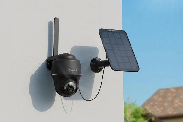 Reolink Go PT Plus 2K+ 5MP Wire-Free 4G LTE PT Battery Camera with Color Night Vision mounted on external wall with solar panel