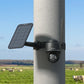 Reolink Go PT Plus 2K+ 5MP Wire-Free 4G LTE PT Battery Camera with Color Night Vision strapped to lamp post with solar panel