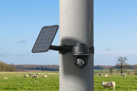 Reolink Go PT Plus 2K+ 5MP Wire-Free 4G LTE PT Battery Camera with Color Night Vision strapped to lamp post with solar panel