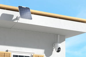 Reolink Go PT Ultra Smart 4K 8MP Wireless 4G LTE PT Battery Camera with Color Night Vision mounted on external wall with solar panel