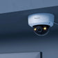 Reolink RLC-540A 5MP IK10 Vandal-Proof PoE Camera mounted on internal ceiling emitting warm spotlight