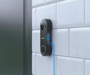 Reolink video doorbell black POE on front door with CAT5e cable graphic behind