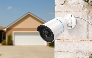 Reolink RLC-510A 5MP PoE IP Camera on external wall protecting house
