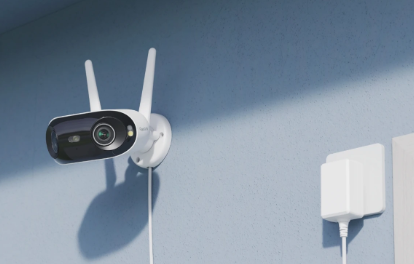 Reolink Elite WIFI camera with antenna plugged into socket on a wall  