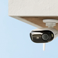 Reolink Elite WIFI Smart home security camera attached to a ceiling with a clear blue sky background